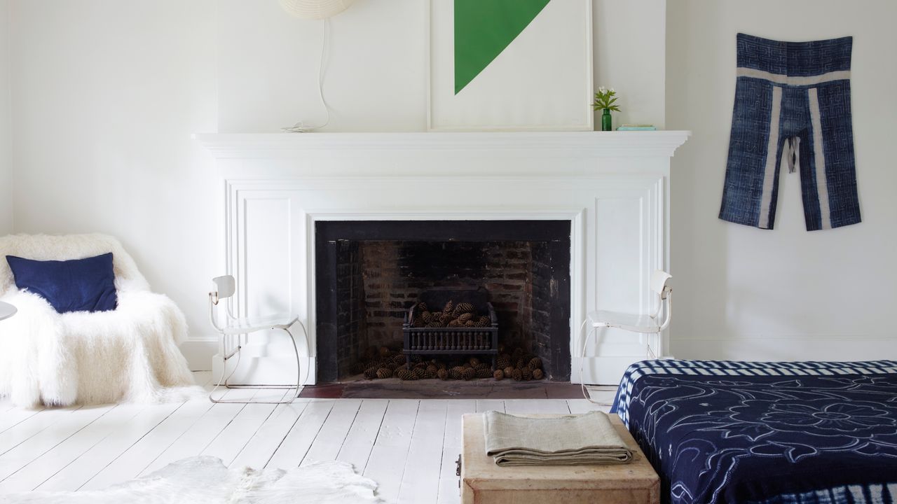 A living space using indigo and denim toned textiles for a layered, elevated interior