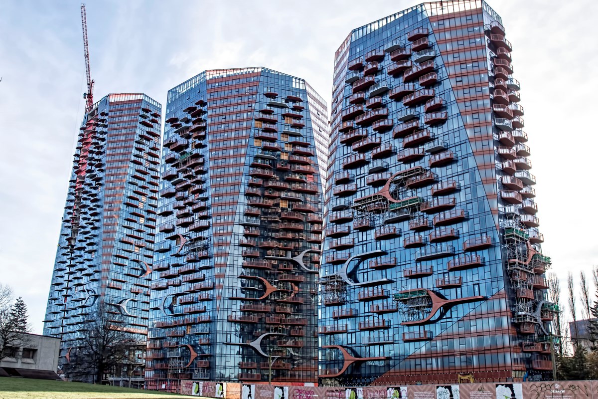 Sen̓áḵw rental towers under development beside the Burrard Street Bridge in Vancouver