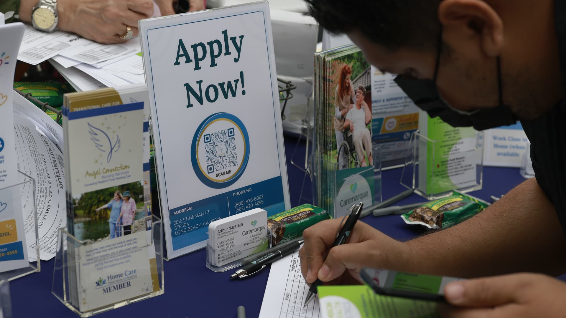 Office workers reviewing economic data related to employment trends