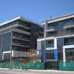 PCL Construction tops off Lakeview DXE Club condo development
