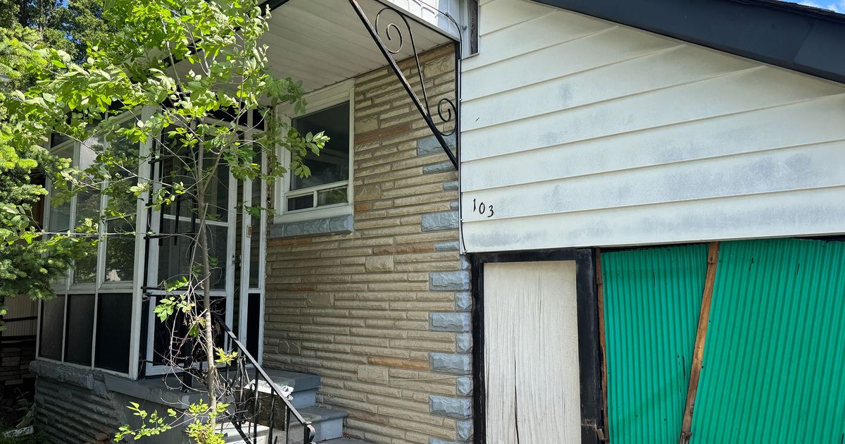 Exterior view of 103 Donside Drive in Toronto, a bungalow listed for renovation or rebuild