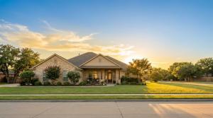 Suburban Texas home exterior representing research into automated home value estimate accuracy