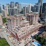 Yonge & Roselawn Towers in Midtown Rising Above Expansive Podium