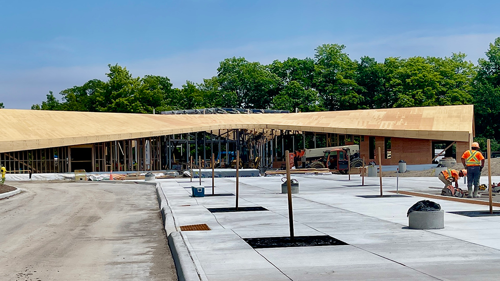 Construction of the Rouge National Urban Park visitor centre, showing its curved rooflines and mass timber elements