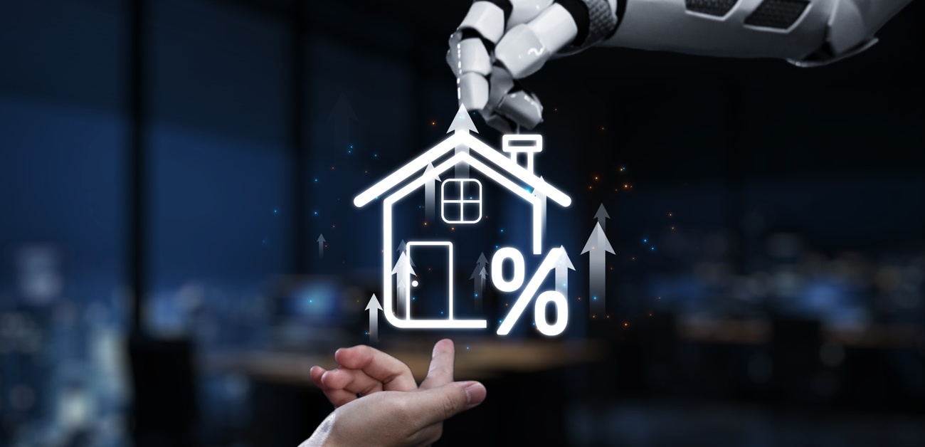 Real estate agent reviewing data alongside a laptop showing AI-generated property analysis