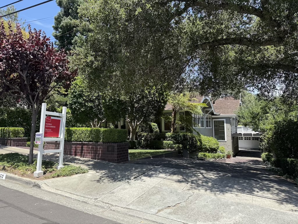 A house for sale sign in front of a Los Gatos property amid rising demand from AI wealth