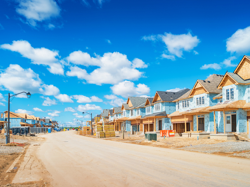 Housing construction site with framing underway