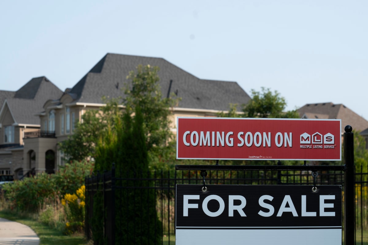 A real estate sign on a residential street in Vaughan, Ontario