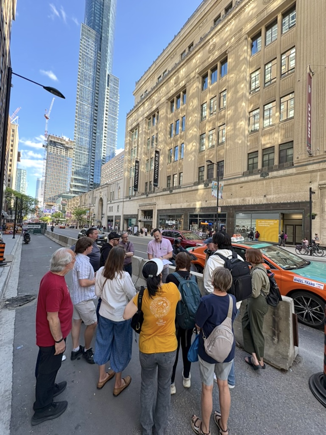 Walking tour group at College Park along the Yonge corridor