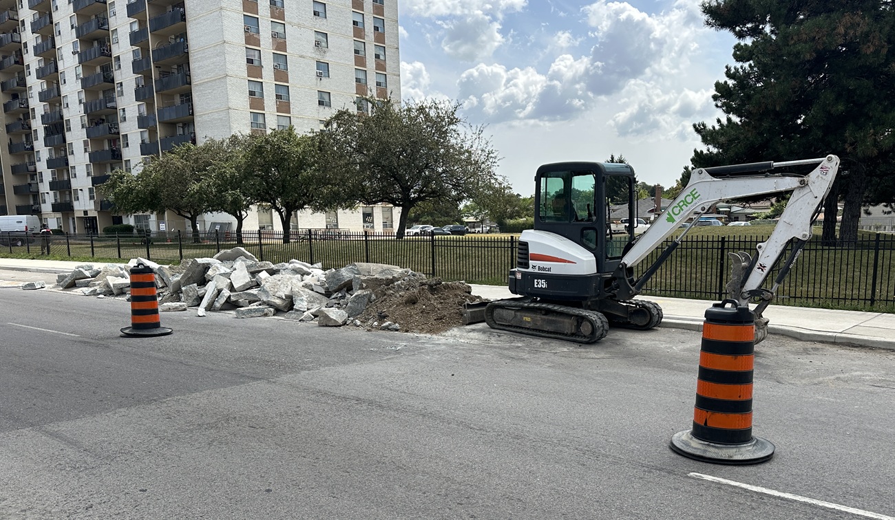 Pile of asphalt and concrete construction debris along Finch Avenue West near the Line 6 LRT corridor