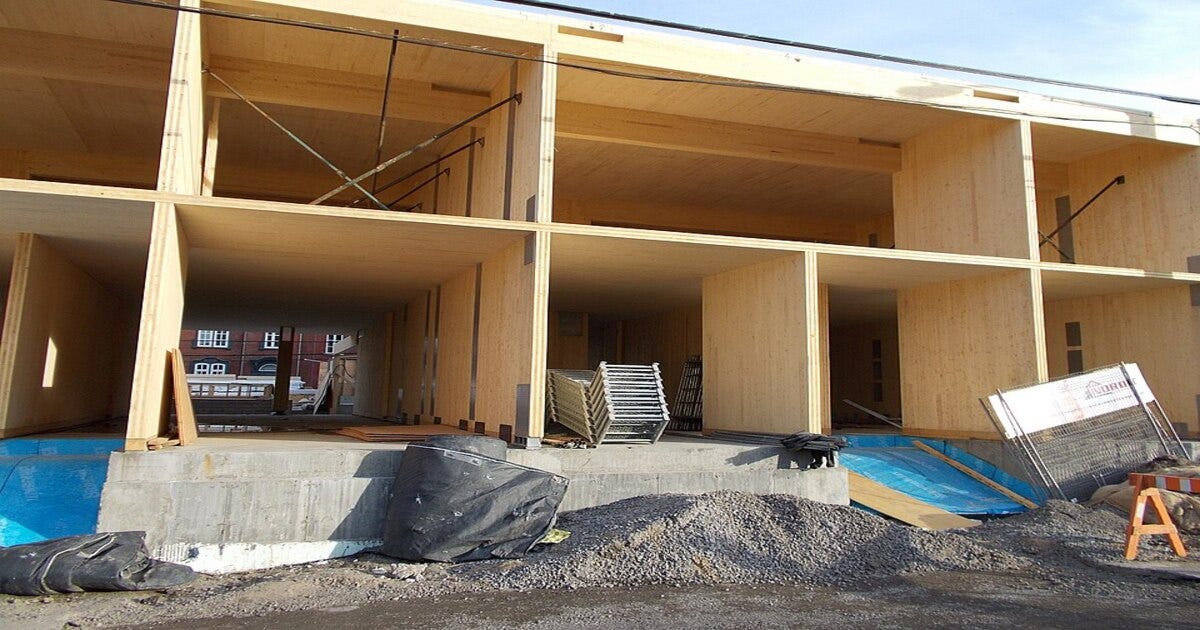 Housing construction site representing declining new project starts