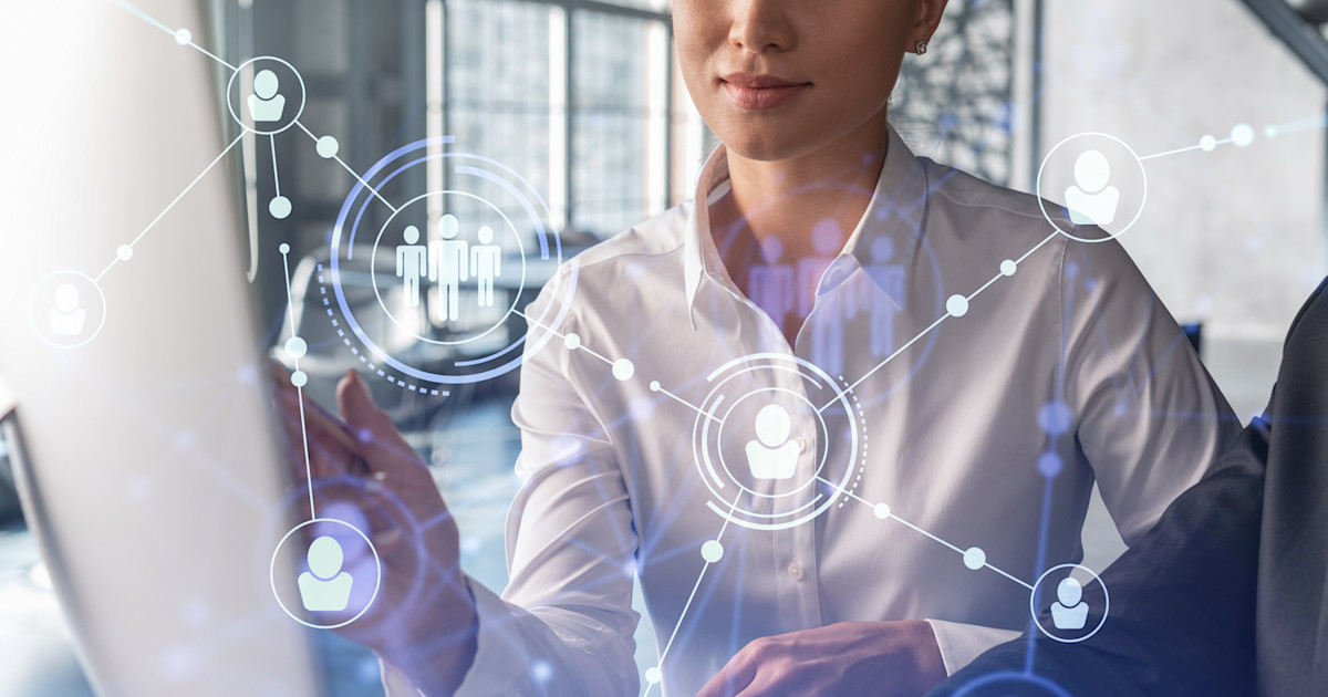 Real estate brokerage leaders reviewing AI risk data on a dashboard