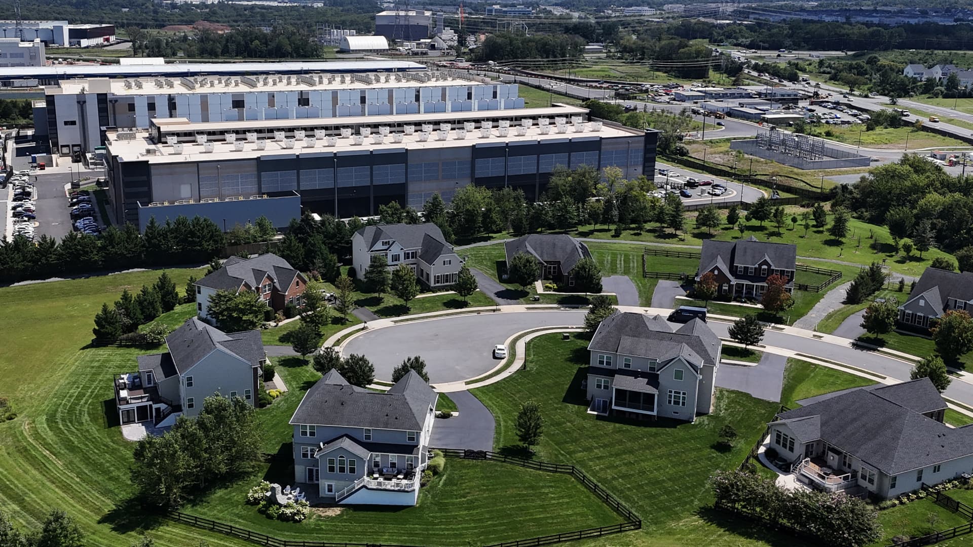 Aerial view of a large data center construction site on former farmland