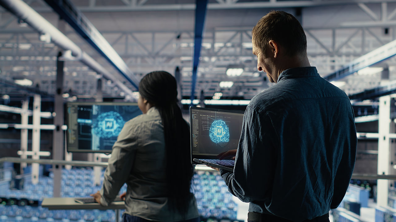 Data center technicians monitoring AI infrastructure systems