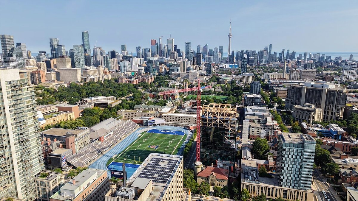 Toronto mass timber tower under construction with glulam frame and crane