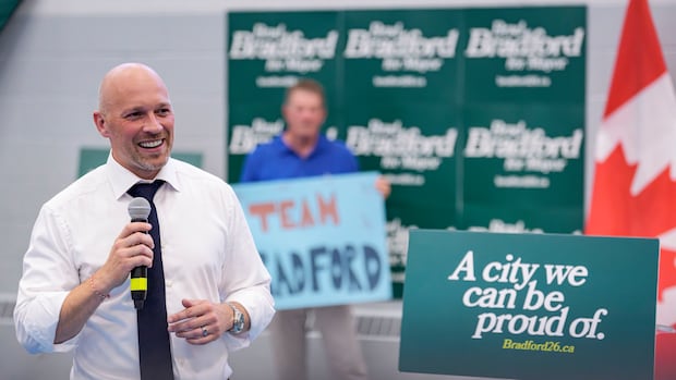 Toronto mayoral candidate speaking at a campaign event about property tax policy