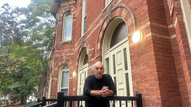 Heritage home at 28-30 Cecil Street in Toronto near a Hydro One transformer station
